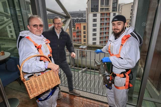 (L to R) Beekeeping project leader Tom Jamieson with Head
of Climate Action at The National Lottery Community Fund, Nick Gardner and project user Jordan