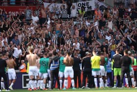  Newcastle United fans show their support in the stands after watching their side win 4-2 at Brentford. (Photo by Eddie Keogh/Getty Images)