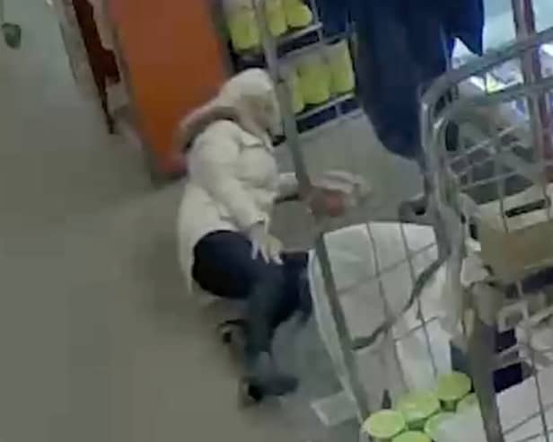 CCTV shows the moment a shopper staged a fake accident in a supermarket to try and claim thousands of pounds in injury compensation from Iceland. 