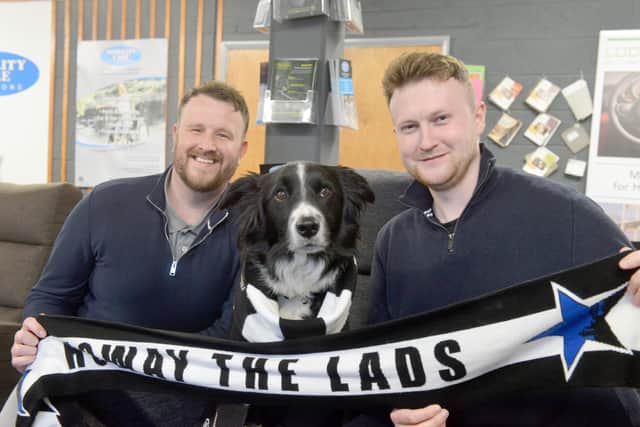 Editor, Liam Kennedy and football writer Jordan Cronin with Mobility Care Solutions' dog Murphy.