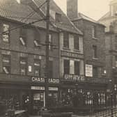 The Groat Market is now a hub for Newcastle's nightlife, with those buildings today occupied by takeaway shops and bars. The public toilet seen in the right corner is also a bar.