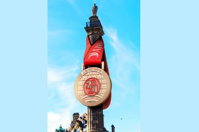 The event's medal has been announced as the countdown reaches the one month point.