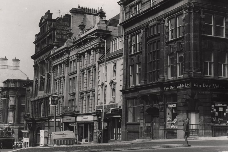 Picture of Mosley Street taken from Pilgrim Street. Mosley Street leads down to Grey Street which can be partially seen in the background.