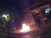 Fires burn outside London shops as police race to extinguish blazes.