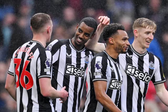 Sean Longstaff (left) pictured celebrating with his Newcastle United teammates