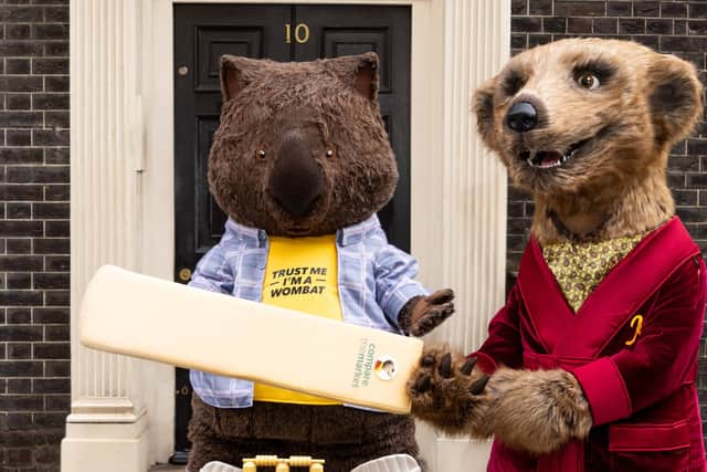Compare the Market mascots Carl and Aleksandr appeared outside what looks remarkably like 10 Downing Street to mark the start of The Hundred.Photo released July 23 2024. 