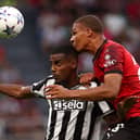 AC Milan defender Malick Thiaw in action against Newcastle United in the Champions League. 