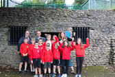 Pupils from Ffynnon Taf Primary School celebrate their new heating system (Photo: Kensa/Supplied)