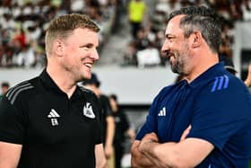 Newcastle United's head coach Eddie Howe (L) and Yokohama F. Marinos' head coach John Hutchinson (R). (Photo by YUICHI YAMAZAKI/AFP via Getty Images)
