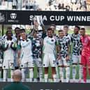  Players of Newcastle United lift the Sela cup during the Pre-Season Friendly between Newcastle United and Stade Brestois  at St James' Park on August 10, 2024 in Newcastle upon Tyne, England. (Photo by Nigel Roddis/Getty Images)