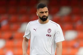 Giorgi Mamardashvili of Valencia CF inspects the pitch prior to the La Liga match between Valencia CF and FC Barcelona at Estadio Mestalla on August 17, 2024 in Valencia, Spain. (Photo by Aitor Alcalde/Getty Images)