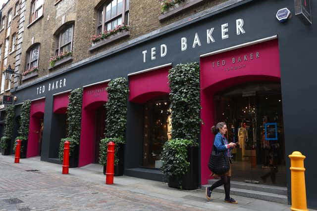 A woman walks past a Ted Baker store in Covent Garden, London (Photo: Peter Nicholls/Getty Images)