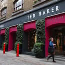 A woman walks past a Ted Baker store in Covent Garden, London (Photo: Peter Nicholls/Getty Images)