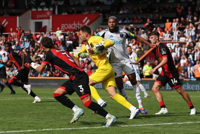 Neto of AFC Bournemouth is fouled by Joelinton of Newcastle United. (Photo by Eddie Keogh/Getty Images)