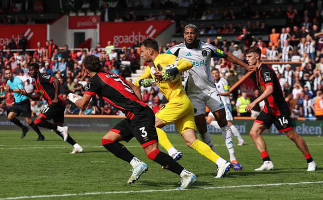 Neto of AFC Bournemouth is fouled by Joelinton of Newcastle United. (Photo by Eddie Keogh/Getty Images)