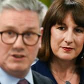 Rachel Reeves listens to Keir Starmer on the Labour general election campaign trail in May (Photo: JUSTIN TALLIS/AFP via Getty Images)