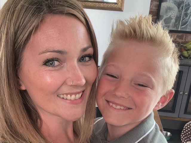 Jay Whitfield, 37, with her seven-year-old son.
