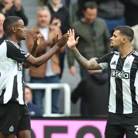 Alexander Isak of Newcastle United celebrates scoring his team's second goal with teammate Bruno Guimaraes during the Premier League match between Newcastle United FC and Tottenham Hotspur FC at St James' Park on September 01, 2024 in Newcastle upon Tyne, England. (Photo by Matt McNulty/Getty Images)