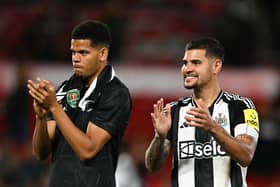 Newcastle United's Danish striker #18 William Osula (L) and Newcastle United's Brazilian midfielder #39 Bruno Guimaraes. (Photo by PAUL ELLIS/AFP via Getty Images)