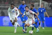 Italy's defender #19 Destiny Udogie (L) and Italy's midfielder #08 Sandro Tonali. (Photo by ATTILA KISBENEDEK/AFP via Getty Images)