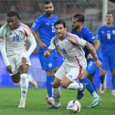 Italy's defender #19 Destiny Udogie (L) and Italy's midfielder #08 Sandro Tonali. (Photo by ATTILA KISBENEDEK/AFP via Getty Images)