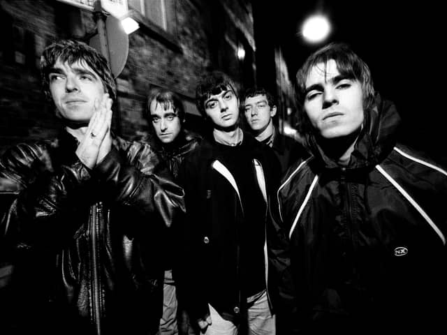 Group portrait of British rock band Oasis in Manchester, United Kingdom, 29th November 1993. L-R Noel Gallagher, Paul Arthurs (aka Bonehead), Paul McGuigan, Tony McCarroll,Liam Gallagher. (Photo by James Fry/Getty Images)