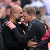 Manchester City manager Pep Guardiola and Newcastle United head coach Eddie Howe. (Photo by Stu Forster/Getty Images)