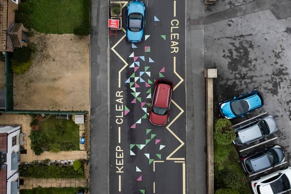 “Dangerous” colourful school road markings.