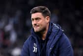 Johnnie Jackson, Head Coach of AFC Wimbledon, looks on prior to the Carabao Cup Third Round match with Newcastle United. (Photo by George Wood/Getty Images)