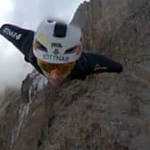 Wingsuit jumper Tim Howell leaps off Mount Kilimanjaro at 5,450m.