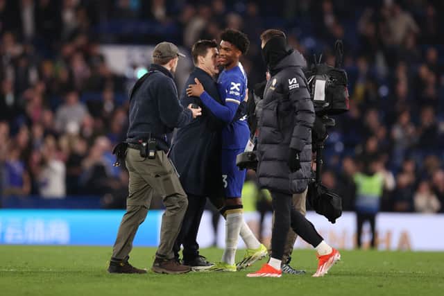 Mauricio Pochettino, Manager of Chelsea, embraces Josh-Kofi Acheampong of Chelsea after the Premier League match between Chelsea FC and Tottenham Hotspur at Stamford Bridge. (Photo by Ryan Pierse/Getty Images)