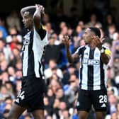 Alexander Isak and Joe Willock react after a missed opportunity during the English Premier League football match between Chelsea and Newcastle United at Stamford Bridge in London on October 27, 2024.