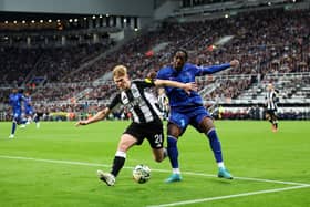 Lewis Hall of Newcastle United is challenged by Axel Disasi of Chelsea during the Carabao Cup Fourth Round match between Newcastle United and Chelsea. (Photo by Ed Sykes/Getty Images)