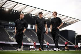 Lewis Hall, Tino Livramento and Anthony Gordon of Newcastle United inspect the pitch prior to the Premier League match between Fulham FC and Newcastle United FC at Craven Cottage. (Photo by Ryan Pierse/Getty Images)