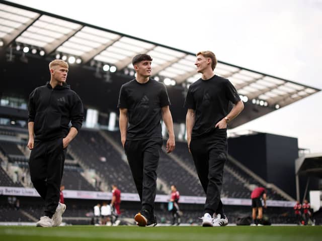 Lewis Hall, Tino Livramento and Anthony Gordon of Newcastle United inspect the pitch prior to the Premier League match between Fulham FC and Newcastle United FC at Craven Cottage. (Photo by Ryan Pierse/Getty Images)