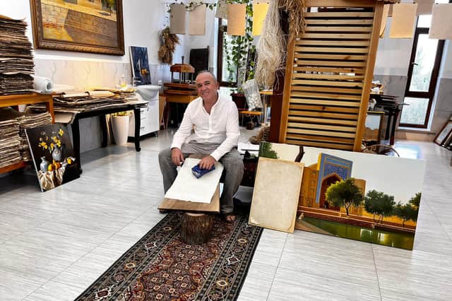 World famous miniaturist Toshev Davron in his studio and art school in Bukhara.