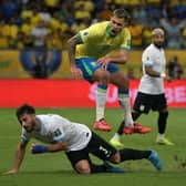 Uruguay's defender #03 Marcelo Saracchi and Brazil's midfielder #05 Bruno Guimaraes. (Photo by NELSON ALMEIDA/AFP via Getty Images)