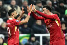 Mohamed Salah of Liverpool celebrates scoring his team's third goal with teammate Curtis Jones during the Premier League match between Newcastle United FC and Liverpool FC at St James' Park. (Photo by Justin Setterfield/Getty Images)