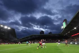 Christian Norgaard of Brentford is challenged by Joelinton of Newcastle United during the Premier League match between Brentford FC and Newcastle United.(Photo by Richard Heathcote/Getty Images)