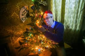 Ross Shaddick from Plymouth, Devon, with his Christmas lights which have finally gone out after 54 years.