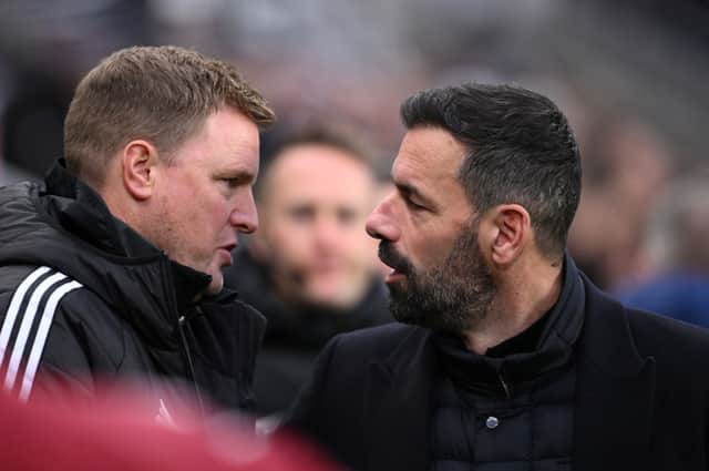 Ruud van Nistelrooy, Manager of Leicester City, and Eddie Howe, Manager of Newcastle United, are seen talking prior to the Premier League match between Newcastle United FC and Leicester City FC. (Photo by Stu Forster/Getty Images)