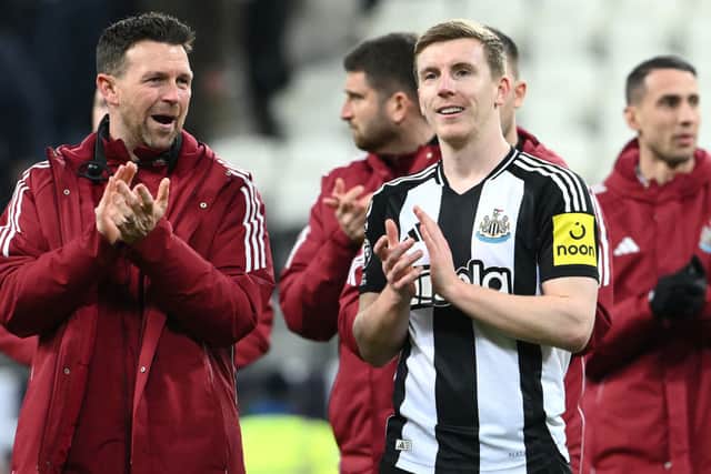 A smiling Matt Targett of Newcastle United applauds the fans following 3-0 win over Aston Villa. (Photo by Stu Forster/Getty Images)