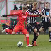  Callum Nicholas of Liverpool and Michael Newberry of Newcastle United in action during the U18 Premier League match  between Liverpool and Newcastle United on February 28, 2015 in Kirkby, England.  (Photo by Nick Taylor/Liverpool FC via Getty Images)