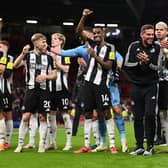 Alexander Isak of Newcastle United, gestures to the fans as he celebrates with his teammates at the end of the Premier League match between Manchester United FC and Newcastle United. (Photo by Stu Forster/Getty Images)