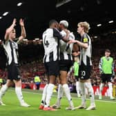 Joelinton of Newcastle United celebrates scoring his team's second goal with teammate during the Premier League match between Manchester United FC and Newcastle United FC at Old Trafford. (Photo by Carl Recine/Getty Images)