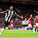 Alexander Isak of Newcastle United celebrates after he scores his team's third goal but it is later disallowed during the Premier League match between Manchester United FC and Newcastle United FC. (Photo by Carl Recine/Getty Images)