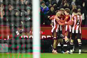 Bryan Mbeumo opens the scoring against Arsenal.