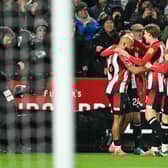 Bryan Mbeumo opens the scoring against Arsenal.