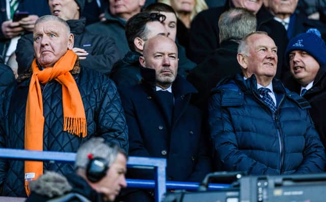 Former Newcastle United and England striker Alan Shearer (centre) watches on as Rangers take on Celtic.