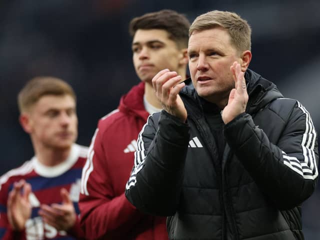 Newcastle United's Eddie Howe applauds fans on the pitch after the English Premier League football match between Tottenham Hotspur and Newcastle United at the Tottenham Hotspur Stadium in London, on January 4, 2025. Newcastle won the game 2-1. (Photo by Adrian Dennis / AFP) 